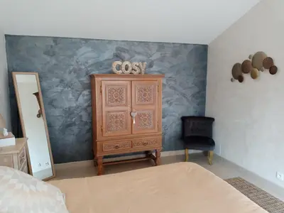 Un ou plusieurs lits dans un hébergement de l'établissement Studio Cosy