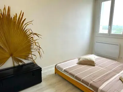 Un ou plusieurs lits dans un hébergement de l'établissement Appartement lumineux 2 chambres face mer à Saint-Jean-de-Monts - FR-1-652-54