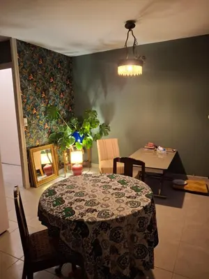 Coin salon dans l'établissement Chambre lit double près de la Loire