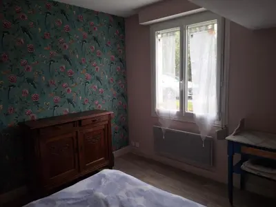 Un ou plusieurs lits dans un hébergement de l'établissement Chambre lit double près de la Loire