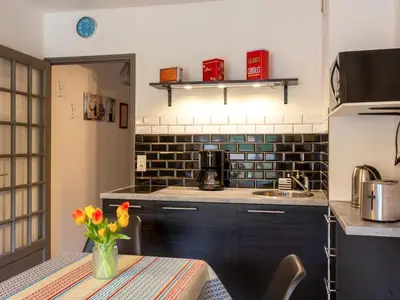 Cuisine ou kitchenette dans l'établissement Apartment La Falaise by Interhome