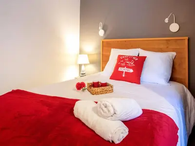Un ou plusieurs lits dans un hébergement de l'établissement Apartment La Falaise by Interhome