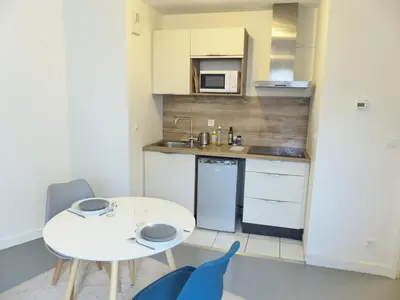 Cuisine ou kitchenette dans l'établissement Petit Mayence - Studio hyper-centre au calme