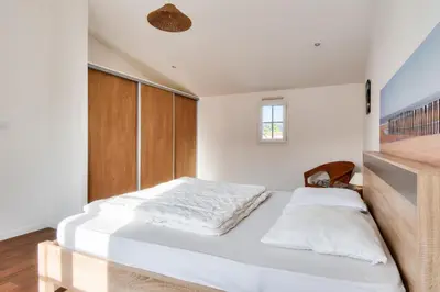 Un ou plusieurs lits dans un hébergement de l'établissement Maison moderne à 80m de la plage - 6 personnes