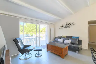 Coin salon dans l'établissement Lovely fully renovated beach villa