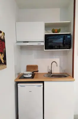 Cuisine ou kitchenette dans l'établissement Domaine des Ecoliers - Gîte 123 soleil - Parking privé