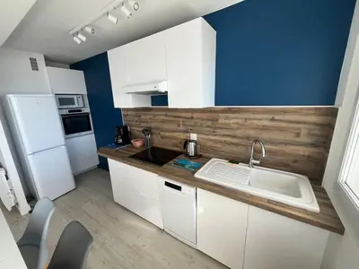Cuisine ou kitchenette dans l'établissement Appartement vue océan