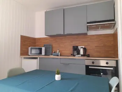 Cuisine ou kitchenette dans l'établissement Au Citron Vert en hyper centre ville