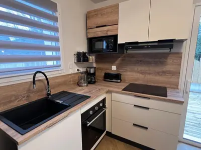 Cuisine ou kitchenette dans l'établissement Sweet Home Two