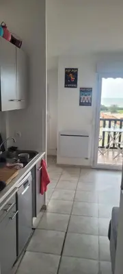 Cuisine ou kitchenette dans l'établissement Appartement vue mer