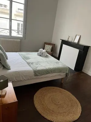 Un ou plusieurs lits dans un hébergement de l'établissement Appartment Doutre-2e étage