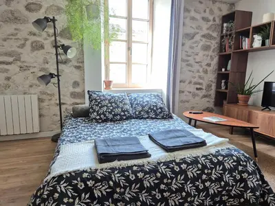 Un ou plusieurs lits dans un hébergement de l'établissement La maison de Pierre, studio à 20 min du Puy du Fou