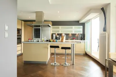 Cuisine ou kitchenette dans l'établissement Rivoli