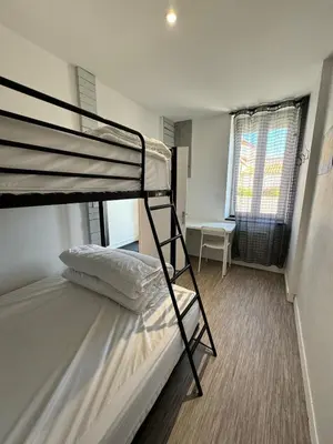 Un ou plusieurs lits dans un hébergement de l'établissement Appart 50M2 - 2 Chambres - Centre-Gare-Mer Plage à pied