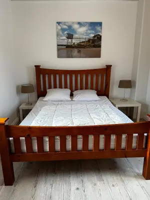 Un ou plusieurs lits dans un hébergement de l'établissement Maison 47m2 meublée 200m plage