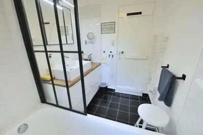 Salle de bains dans l'établissement La Maison de Flo