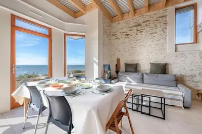 Coin salon dans l'établissement Vue mer, 30m de la plage, 5 adultes & 1 enfant