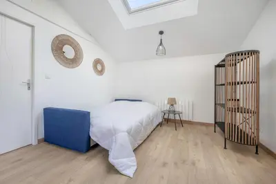 Un ou plusieurs lits dans un hébergement de l'établissement Maison avec dépendance pour 11 à 800m de la mer