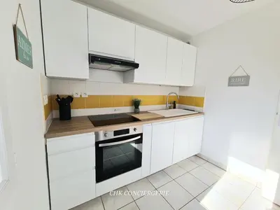 Cuisine ou kitchenette dans l'établissement La Balière T3 rénové terrasse 20min du Puy duFou
