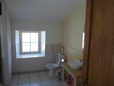 Salle de bains dans l'établissement Gîte des trois pommes