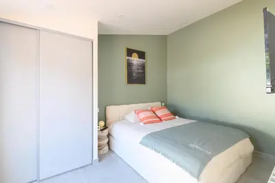 Un ou plusieurs lits dans un hébergement de l'établissement Maison de plage 5 étoiles avec Spa