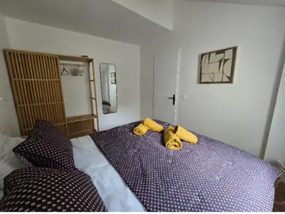 Un ou plusieurs lits dans un hébergement de l'établissement Centre ville Appart T2, 2 à 4 pers, immeuble de caractère