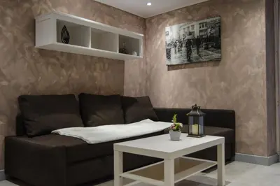 Coin salon dans l'établissement Au domaine de la maisonnette