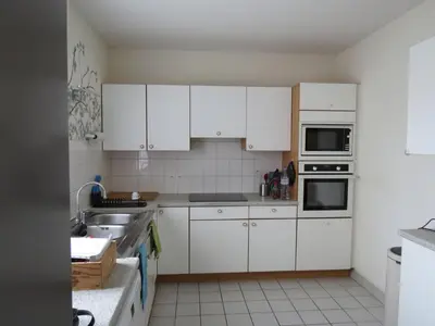 Cuisine ou kitchenette dans l'établissement Home SAINT-MAURILLE coeur d'Angers et Parking