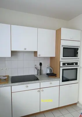 Cuisine ou kitchenette dans l'établissement Home SAINT-MAURILLE coeur d'Angers et Parking