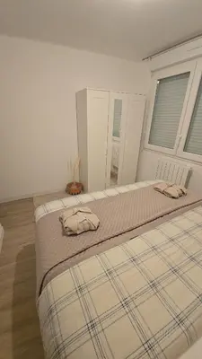 Un ou plusieurs lits dans un hébergement de l'établissement Chambre