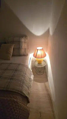 Un ou plusieurs lits dans un hébergement de l'établissement Chambre