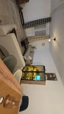 Coin salon dans l'établissement Chambre