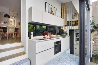 Cuisine ou kitchenette dans l'établissement Le Jardin Secret - 2 chambres & Parking Offert