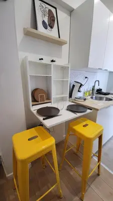 Cuisine ou kitchenette dans l'établissement Le CoCon Nantais 2pers Wi-Fi TV