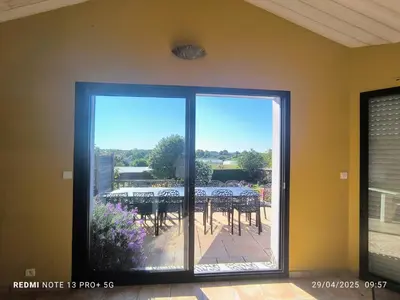 Balcon ou terrasse dans l'établissement Le Gîte du Côteau - 14 personnes - 15mn du Parc