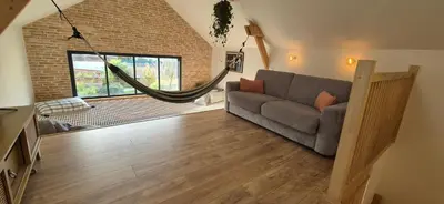 Coin salon dans l'établissement La Cabane Cé
