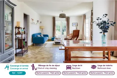 Coin salon dans l'établissement Maison pour 7 à 900m de la plage avec jardin