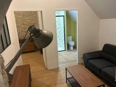 Coin salon dans l'établissement Le domaine des mortiers appartement T2