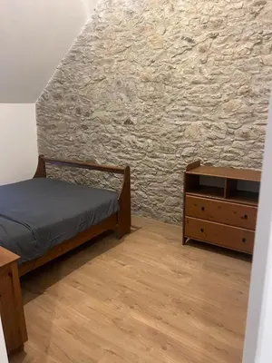 Un ou plusieurs lits dans un hébergement de l'établissement Le domaine des mortiers appartement T2
