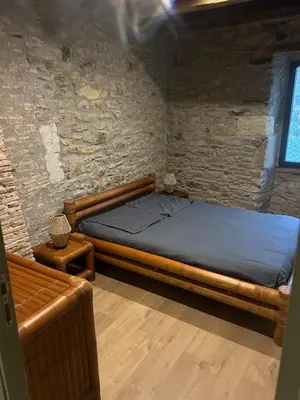Un ou plusieurs lits dans un hébergement de l'établissement Le domaine des mortiers appartement T2