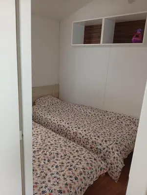 Un ou plusieurs lits dans un hébergement de l'établissement Mobile home 6 personnes 1semaine minimum juillet août