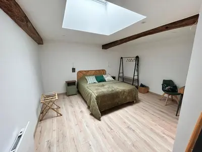 Un ou plusieurs lits dans un hébergement de l'établissement Chambres d'hôtes LA GRANGE DU PA de LA GROLLE