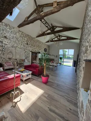 Coin salon dans l'établissement Chambres d'hôtes LA GRANGE DU PA de LA GROLLE