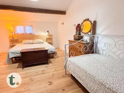 Un ou plusieurs lits dans un hébergement de l'établissement Tranquiloue - Maison paisible à 7min du PuyduFou