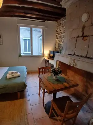 Un ou plusieurs lits dans un hébergement de l'établissement Studio CENTRE VILLE ANGERS 1ER ETAGE - 2 PERSONNES