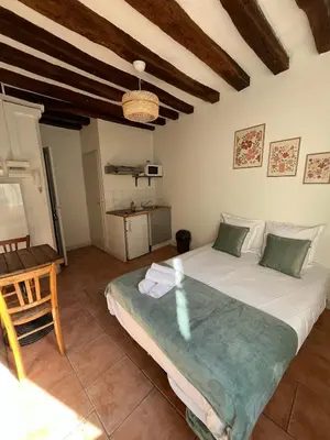 Un ou plusieurs lits dans un hébergement de l'établissement Studio CENTRE VILLE ANGERS 1ER ETAGE - 2 PERSONNES