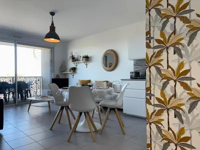 Cuisine ou kitchenette dans l'établissement Appartement cosy moderne avec terrasse et parking, à 50m de la plage - FR-1-323-569