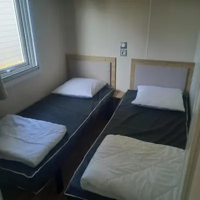 Un ou plusieurs lits dans un hébergement de l'établissement Mobil-home Saint Jean de mont