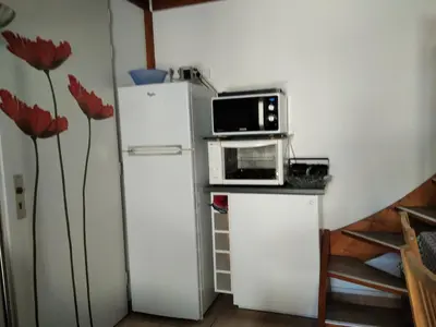 Cuisine ou kitchenette dans l'établissement Maison