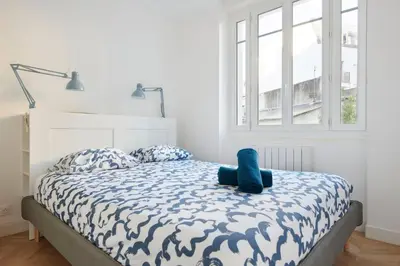 Un ou plusieurs lits dans un hébergement de l'établissement Le Cocon du Batonnier